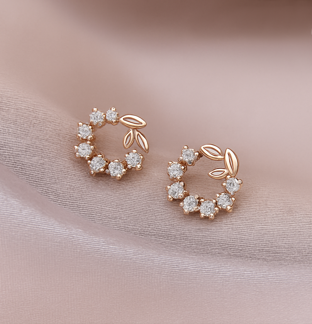 “Delicate floral halo studs in gold and crystal, radiating soft beauty and grace – Pearl Bloom by Dazzling Pearl.”