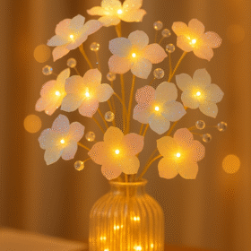 A dreamy bouquet of pastel-toned artificial roses softly glowing with warm LED lights, arranged in a clear glass vase — creating a romantic and peaceful ambiance for home décor.