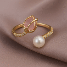 “Gold ring with rose quartz flower and pearl symbolizing love and emotional healing – Pearl Bloom by Dazzling Pearl.”